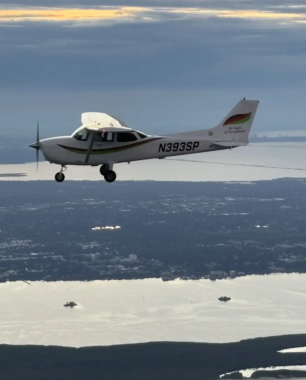 Cirrus Aviation Cessna 172 flying over the Florida Gulf Coast
