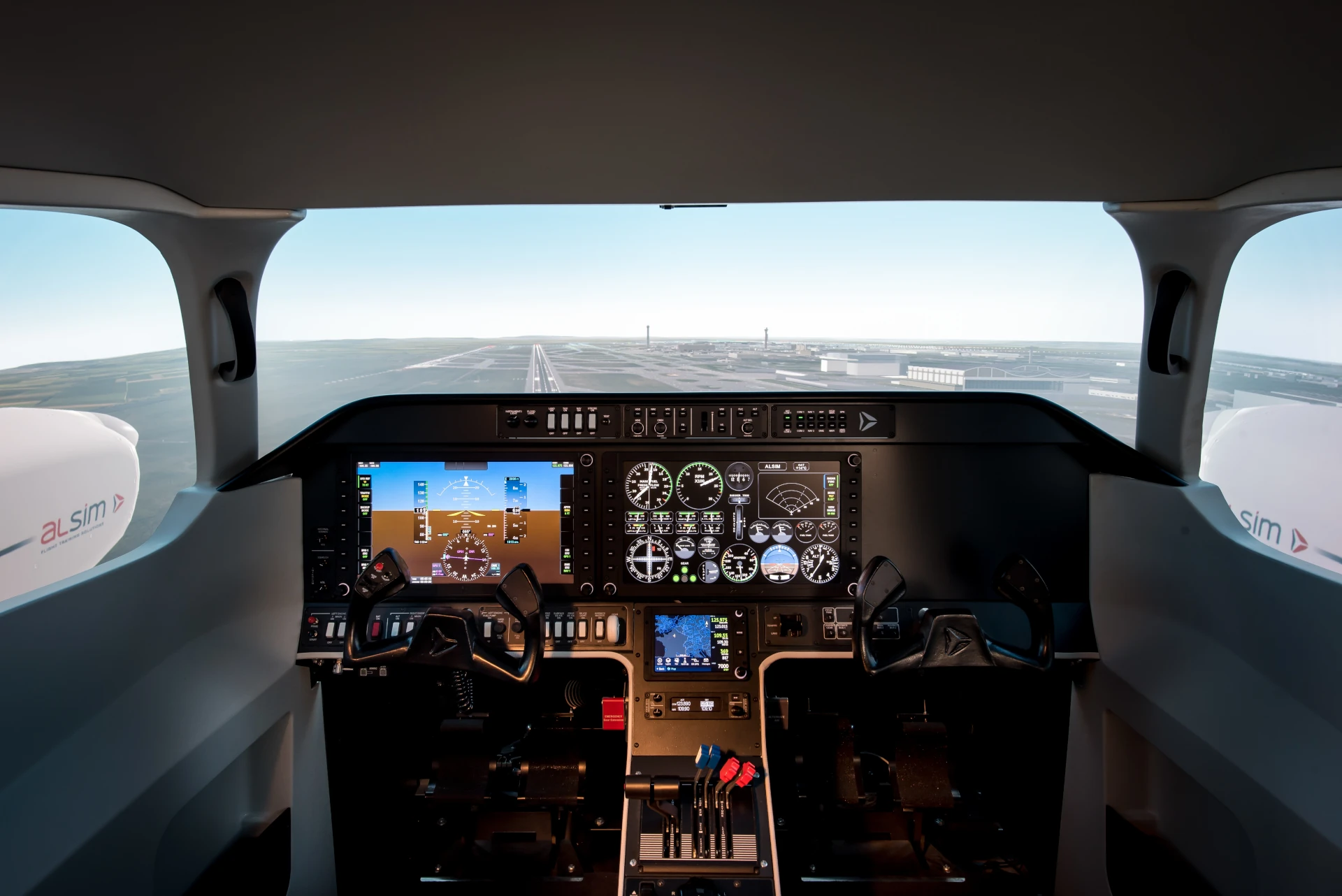 Instrument panel and runway view inside an AL250 flight simulator