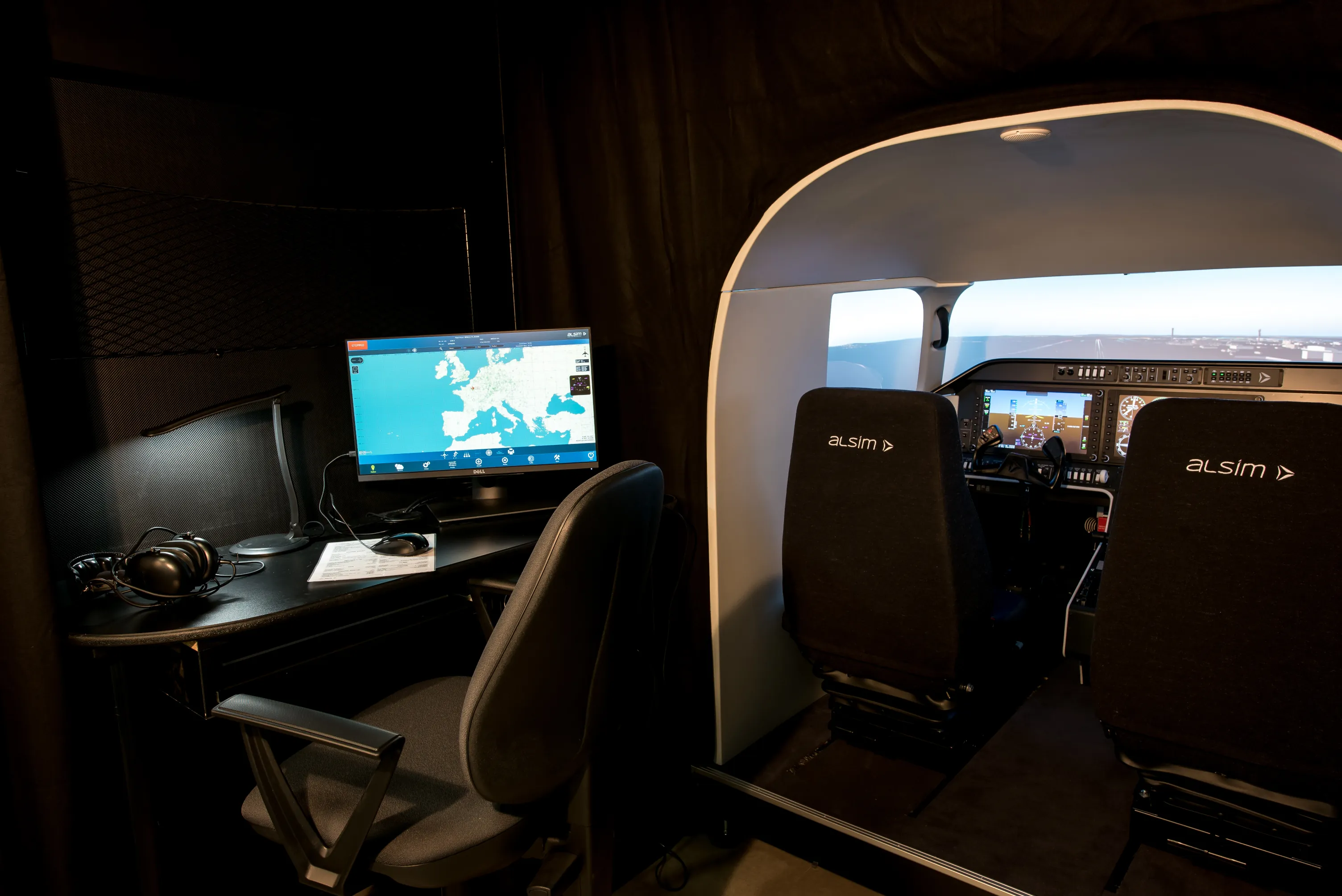 Full-size Alsim AL250 flight simulator at Cirrus Aviation seen from outside