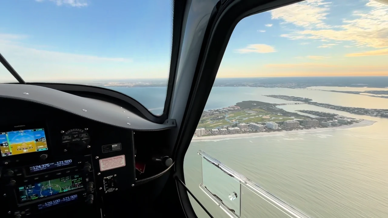 View through an airplane cockpit during a flight over Florida