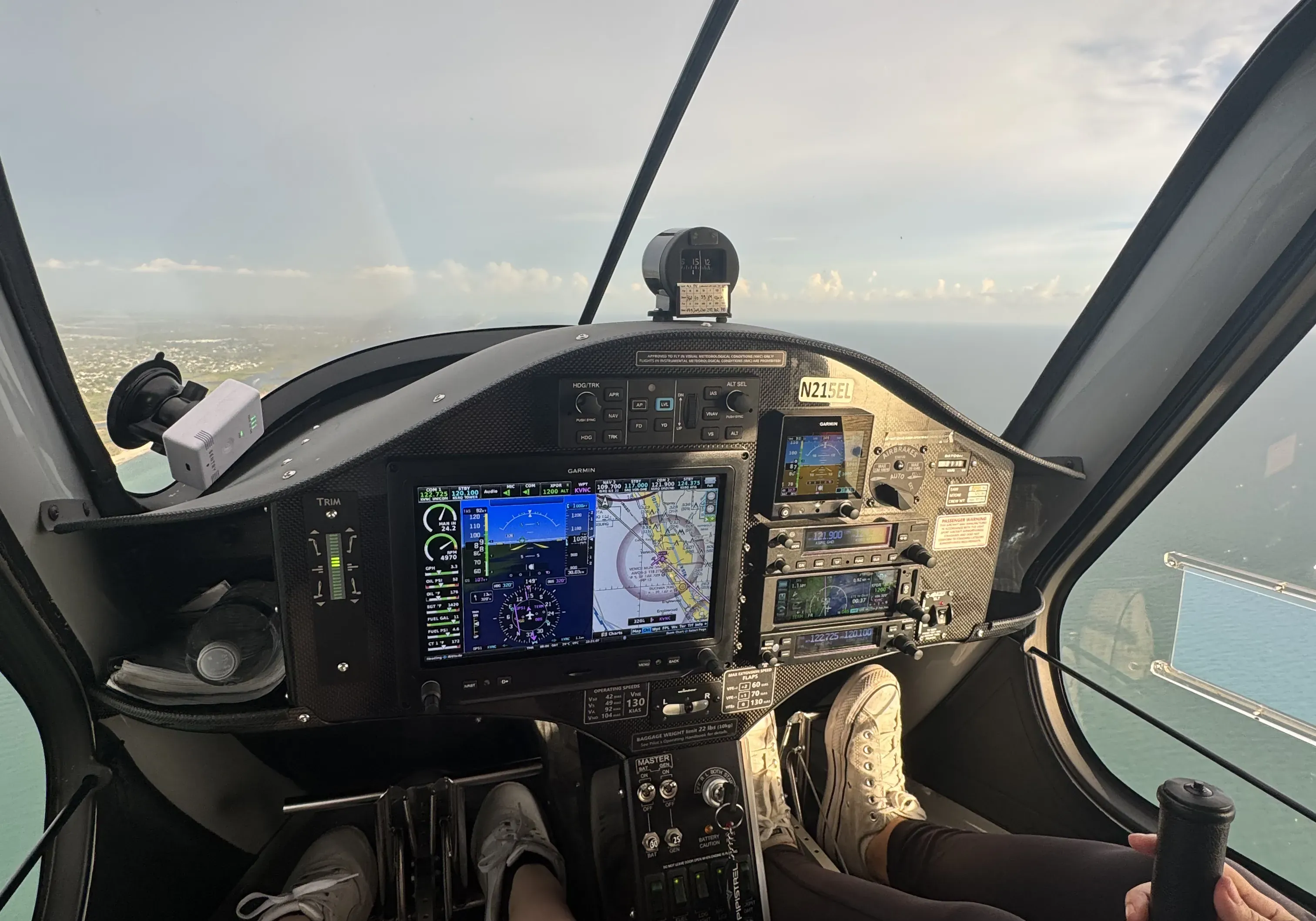 Inside of the cockpit of an airplane with two pilots during flight